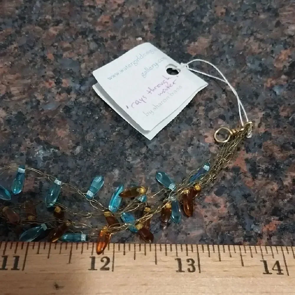 Chic Beaded Necklace with Blue and Brown Accents.